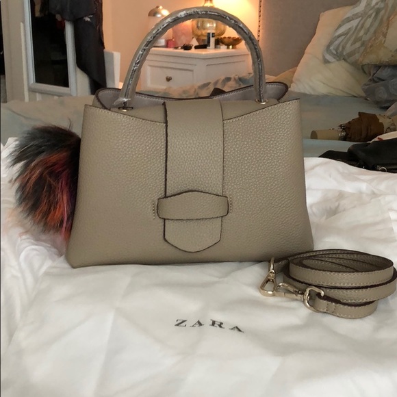 Zara Handbags - Zara purse w/Pom Pom